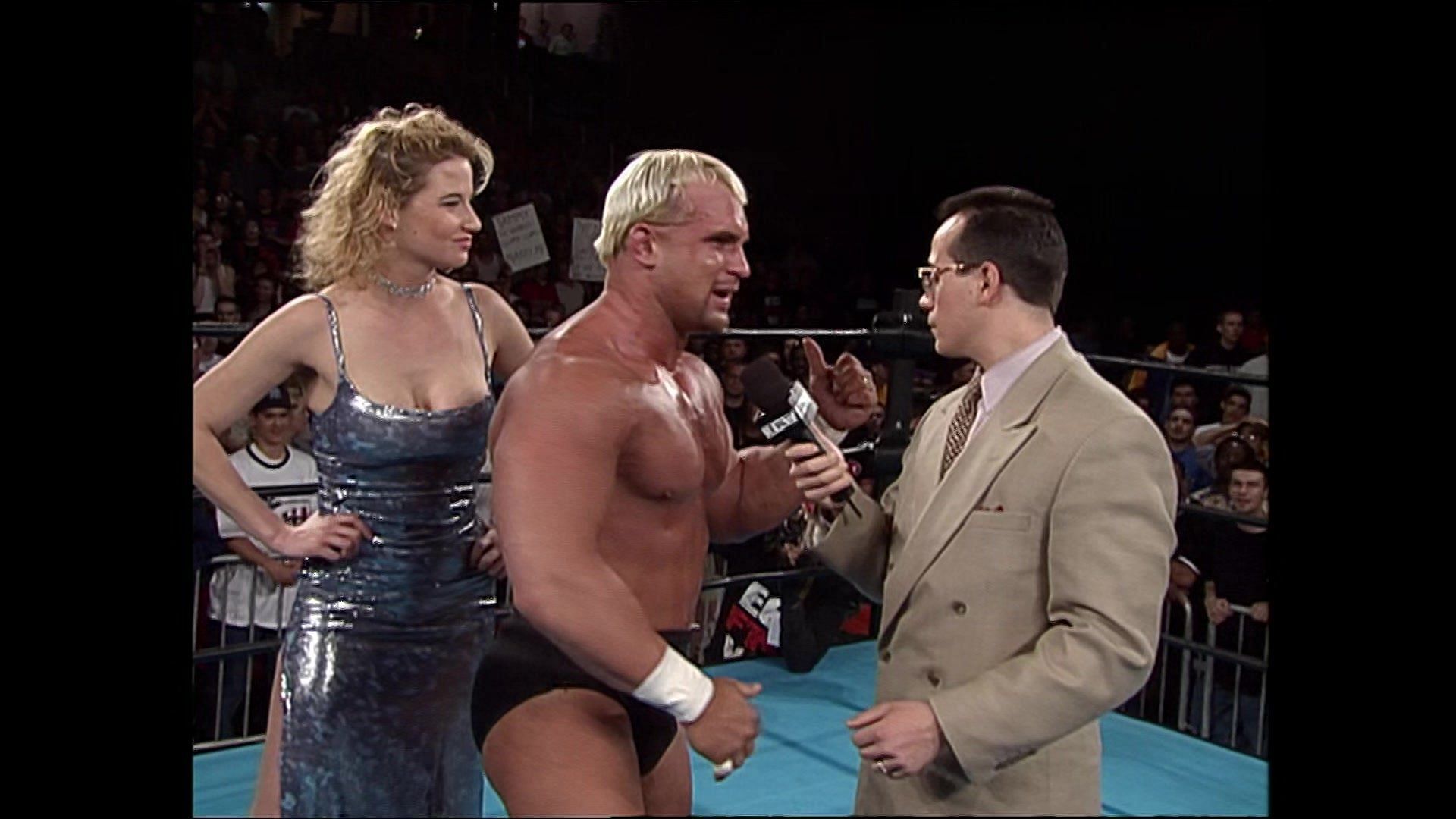 Sunny, Chris Candido, and Joey Styles