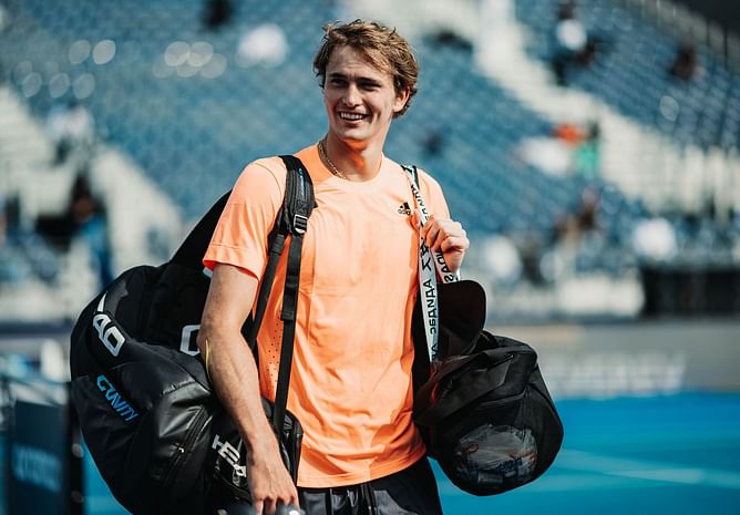 Alexander Zverev says he is "happy to be back competing" after scoring a win in his first appearance since the 2022 French Open