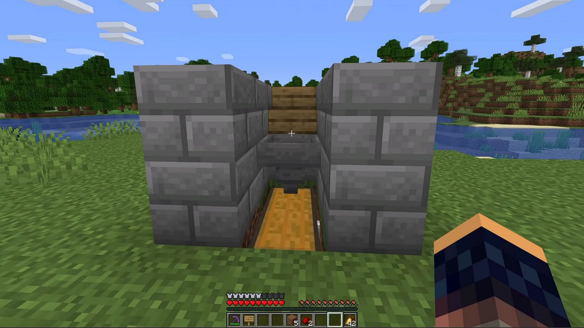 Players must first create the base of the Minecraft farm where they will stand and place concrete powder blocks (Image via YouTube/Shulkercraft)