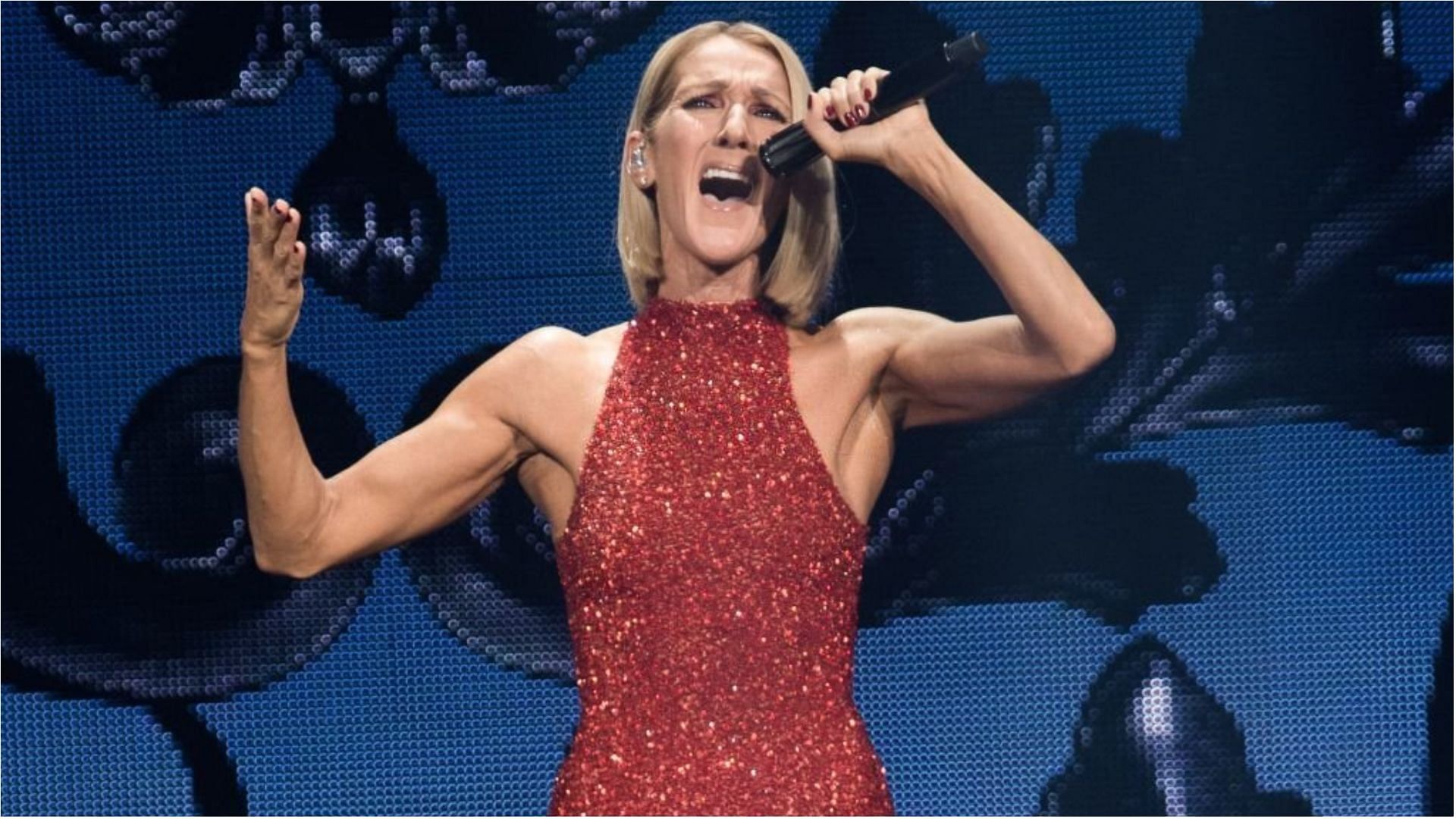 Celine Dion postponed her upcoming shows after being diagnosed with Stiff-person syndrome (Image via Alice Chiche/Getty Images)