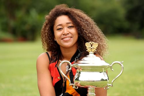 Naomi Osaka poses with the 2021 Australian Open women's trophy