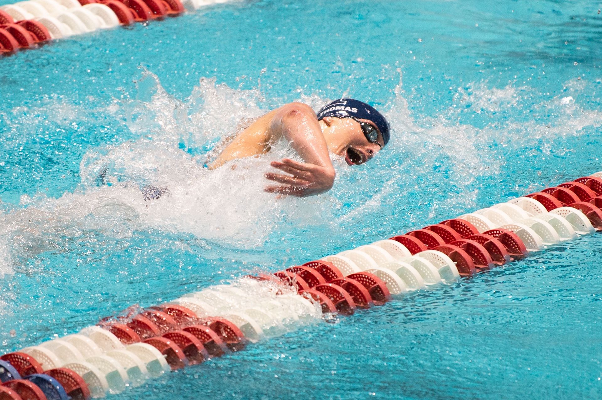 Thomas swims during the 400-yard freestyle relay at the Ivy League Women&#039;s Swimming and Diving Championships, 2022 (Photo by Kathryn Riley/Getty Images)