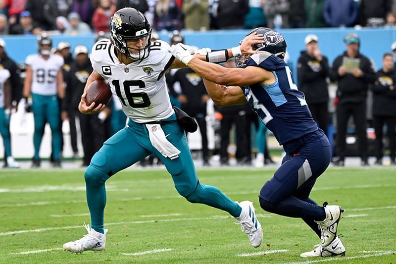 Trevor Lawrence shaking off a sack against the Titans