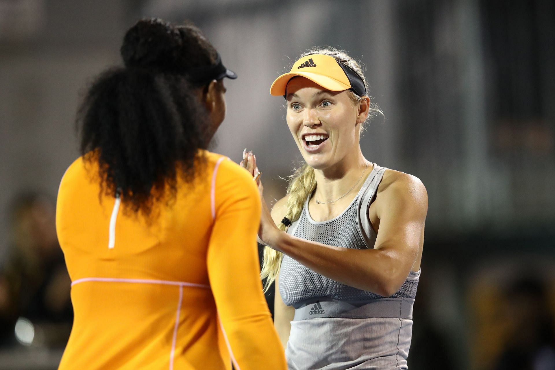 Serena Williams and Caroline Wozniacki during their doubles semifinal