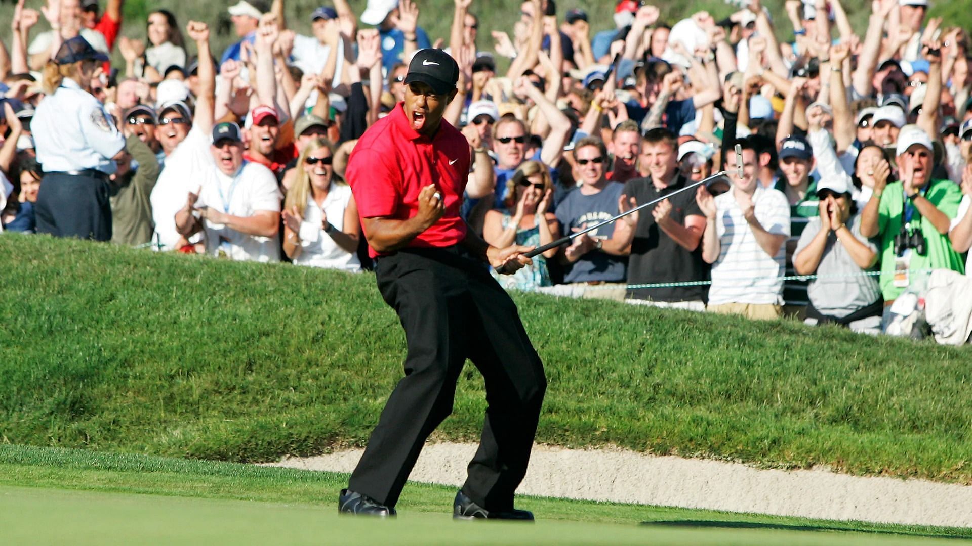 Woods celebrating his shot(File Image Via Getty)