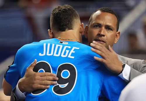  Aaron Judge hugs Alex Rodriguez during batting practice for the 88th MLB All-Star Game on July 11, 2017 in Miami, Florida.