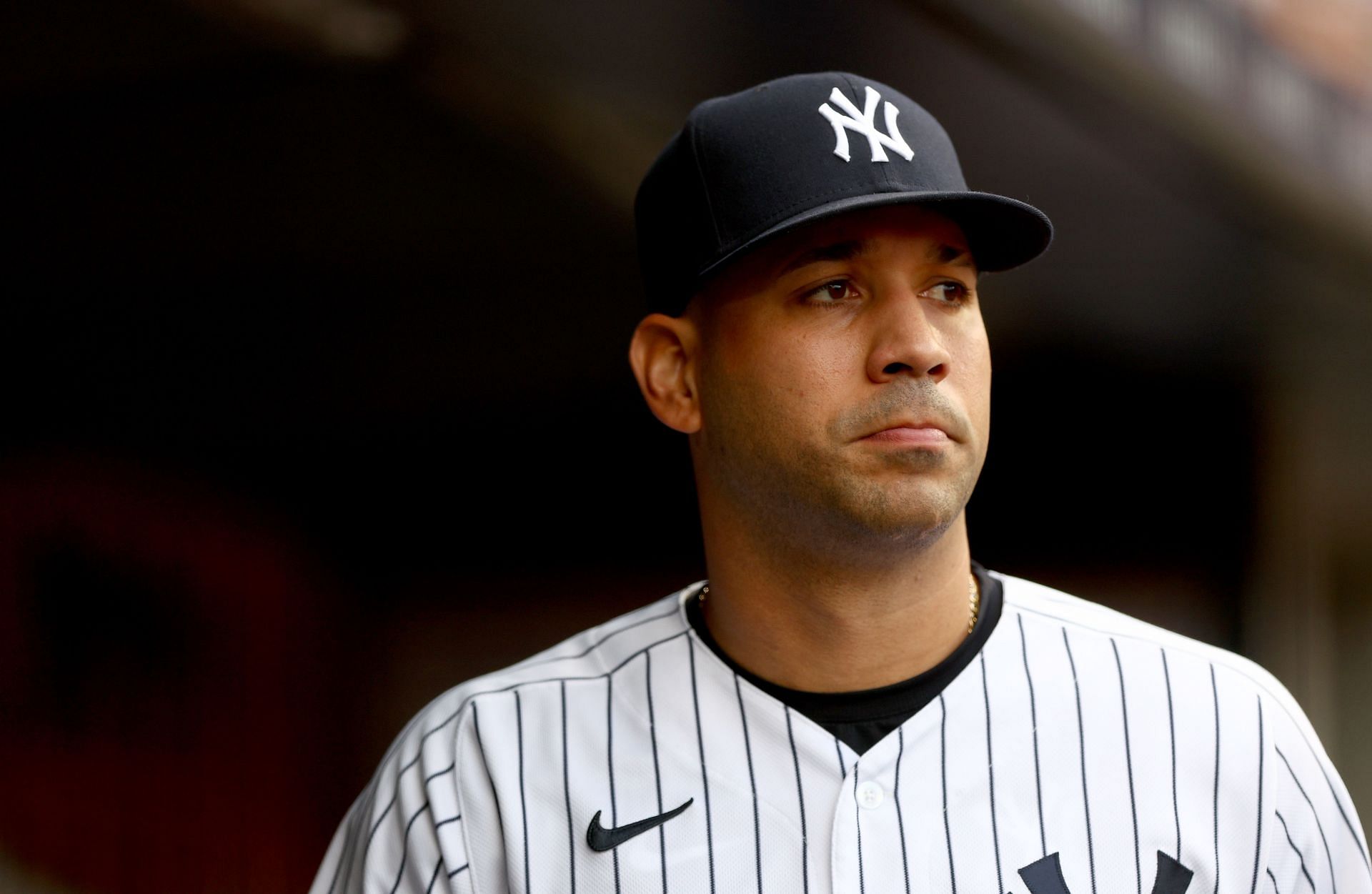 Marwin Gonzalez of the New York Yankees reacts after reaching