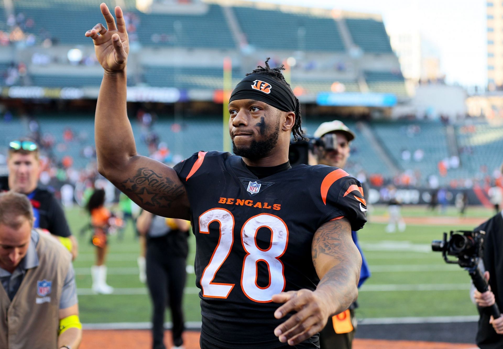 Joe Mixon of the Cincinnati Bengals walks off the field after a win