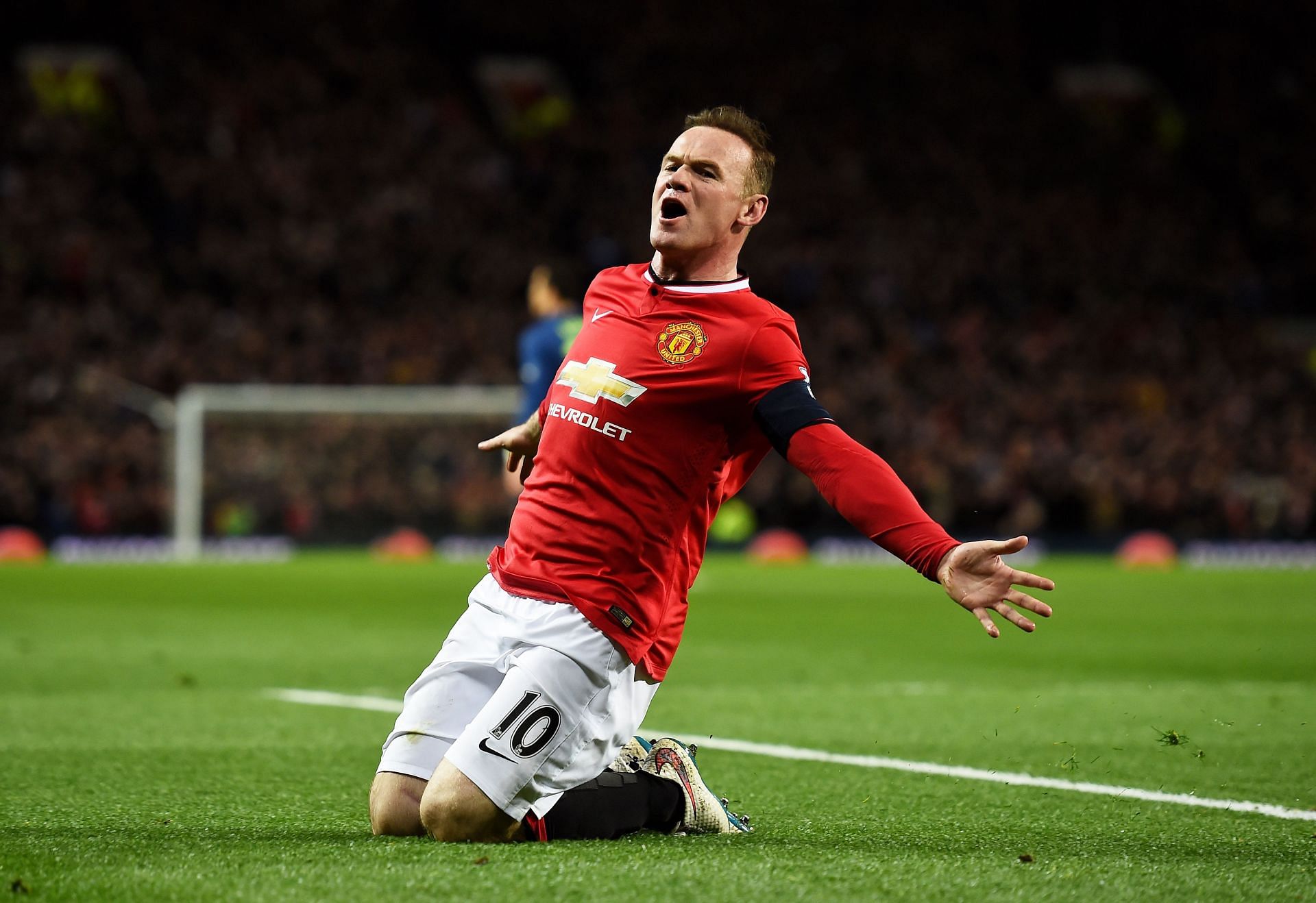 EnterWayne Rooney celebrates a goal, Manchester United v Arsenal - FA Cup Quarter Final 2009 caption