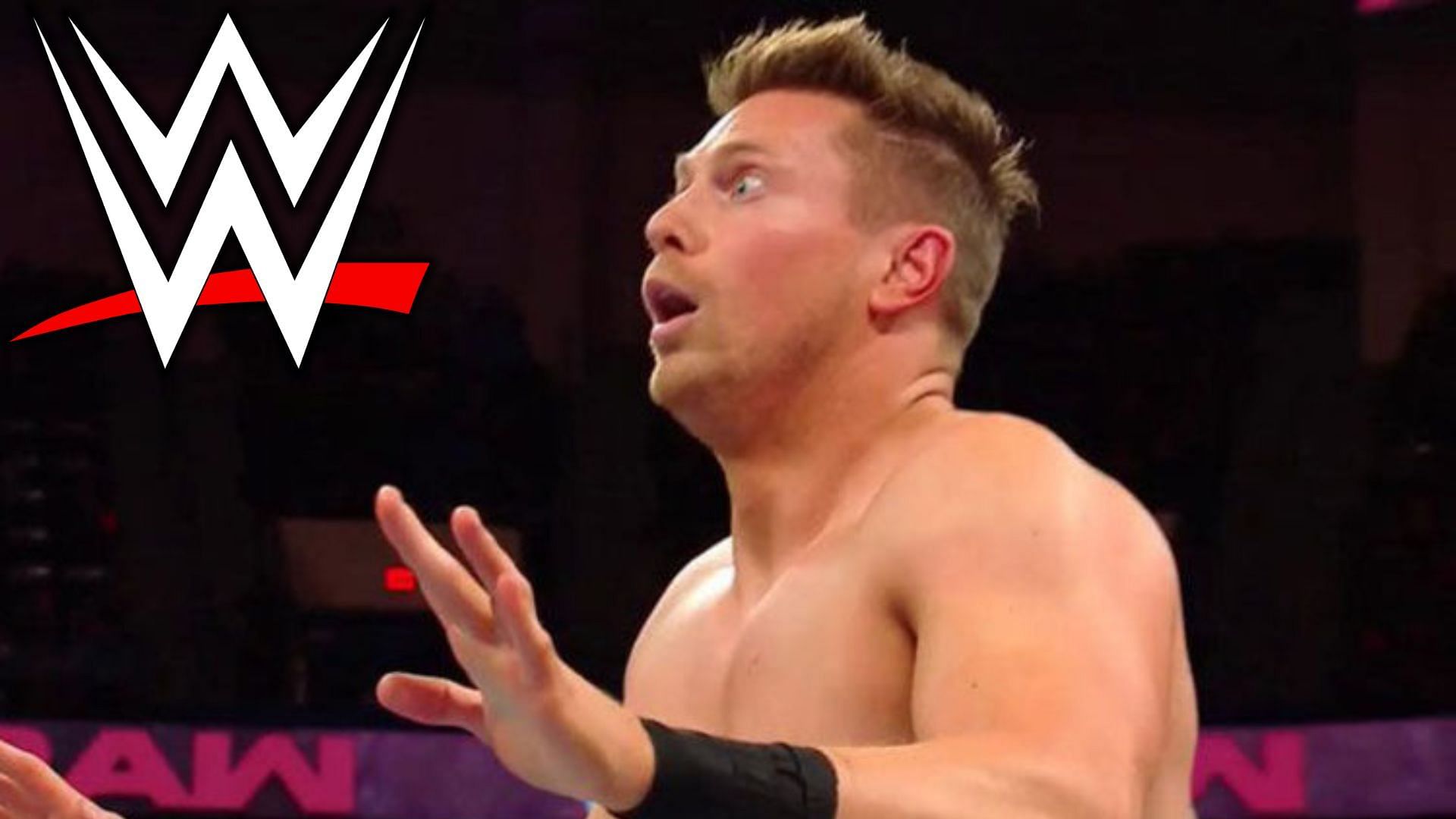 WWE wrestler The Miz shines the belt and temporarily blinds the