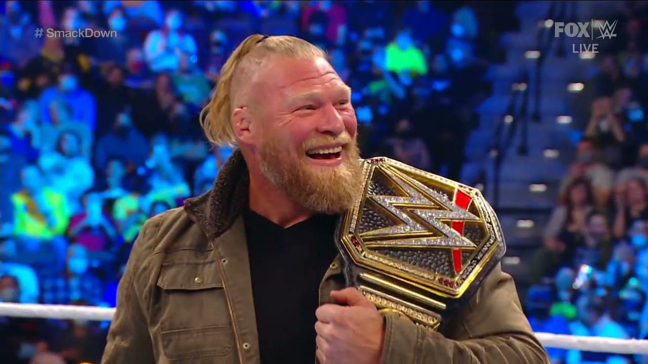 Brock Lesnar holding the WWE title