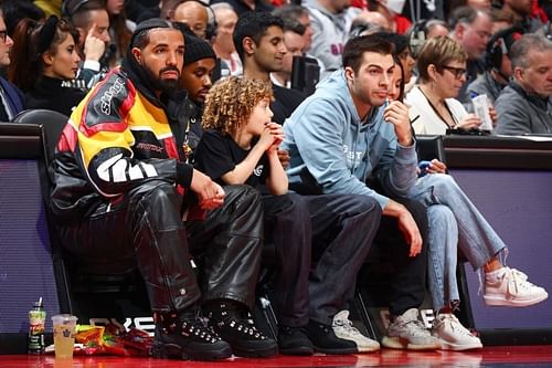 Toronto Raptors global ambassador Drake attending the Raptors' recent game versus the LA Clippers with his son Adonis.