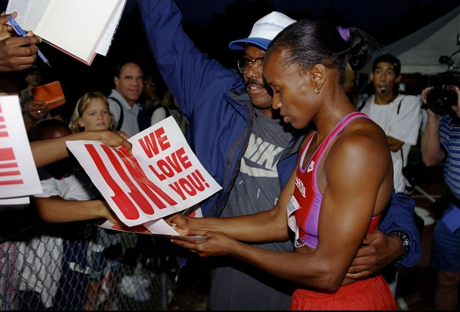 Do Athing Mu and Sydney McLaughlin share the same coach?