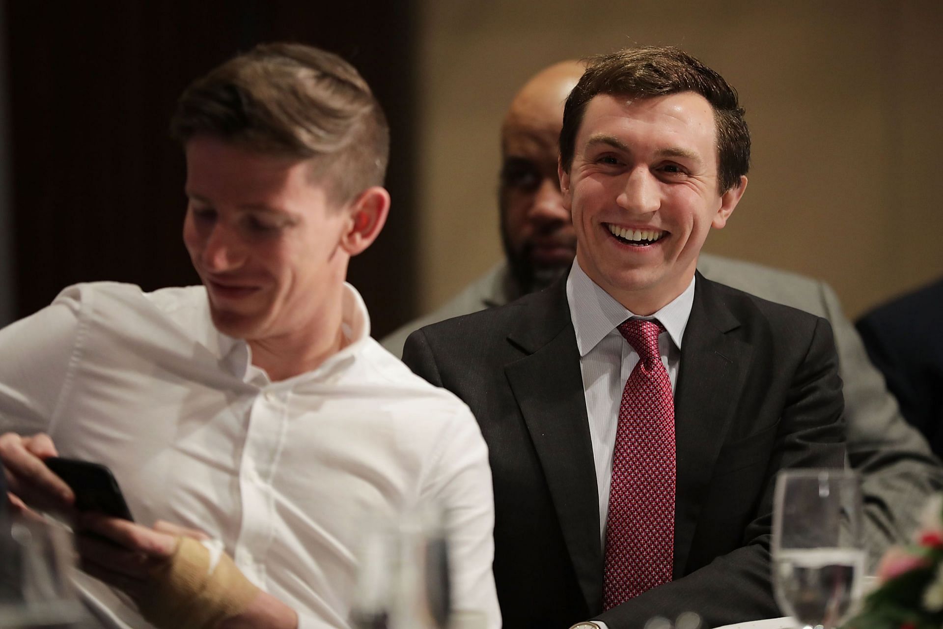 Michale Ledecky (R) looks on as his sister Katie discusses her future at Nat&#039;l Press Club (Photo by Chip Somodevilla/Getty Images)