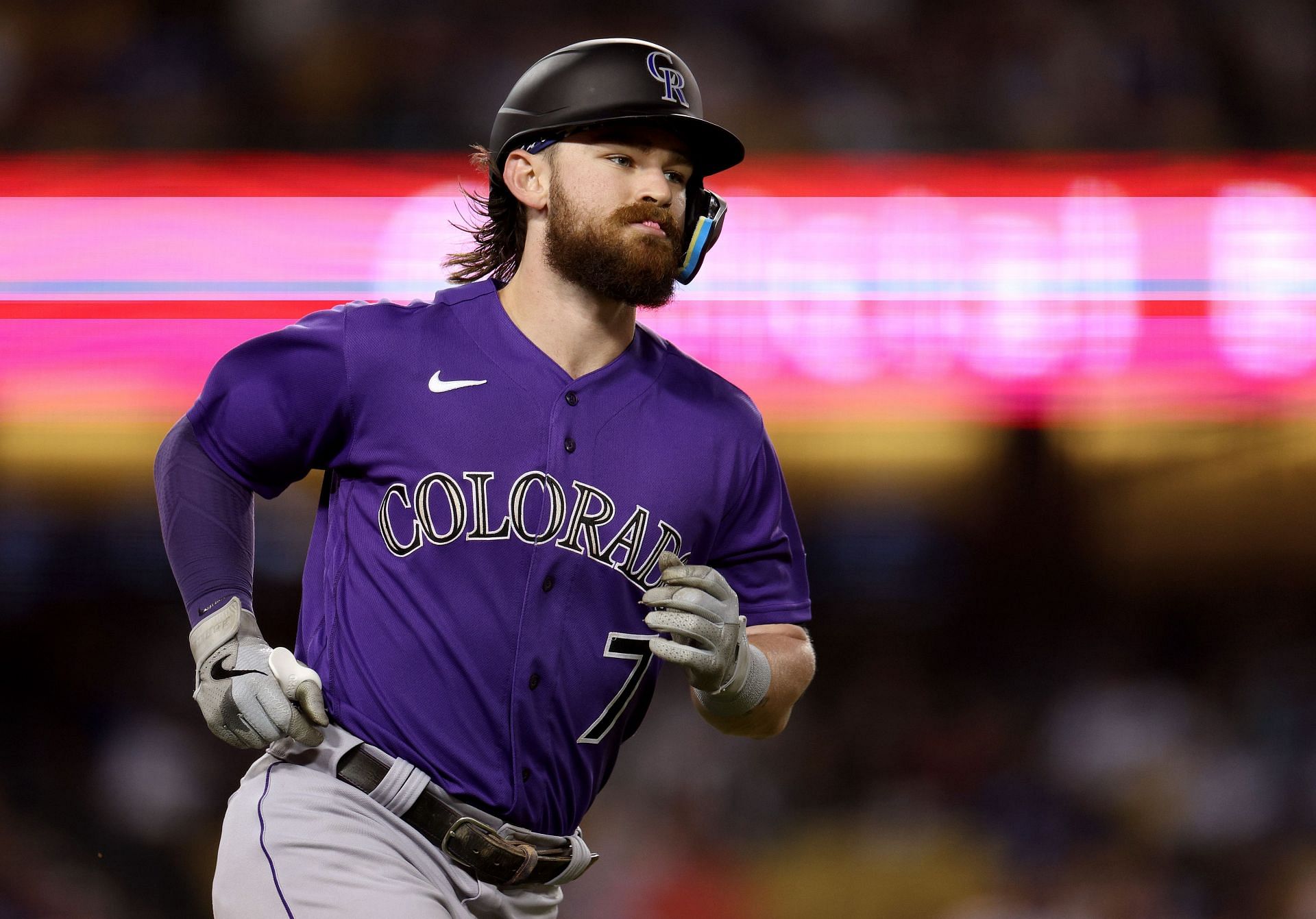 Brendan Rodgers #7 of the Colorado Rockies runs the bases after hitting a home run.