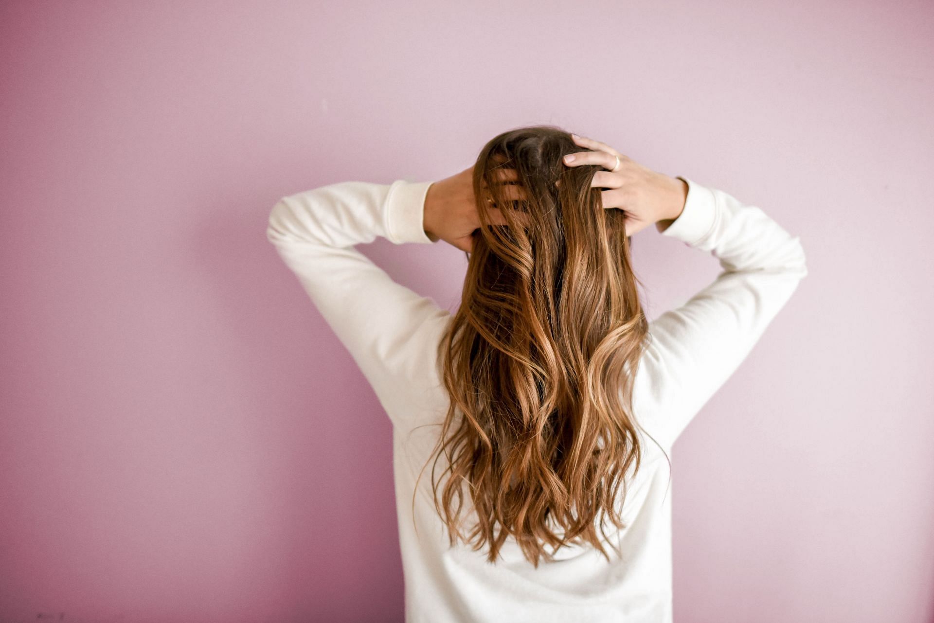 Yoga for hair growth can help you improve your hair and scalp health (Image via Pexels @Element Digital)