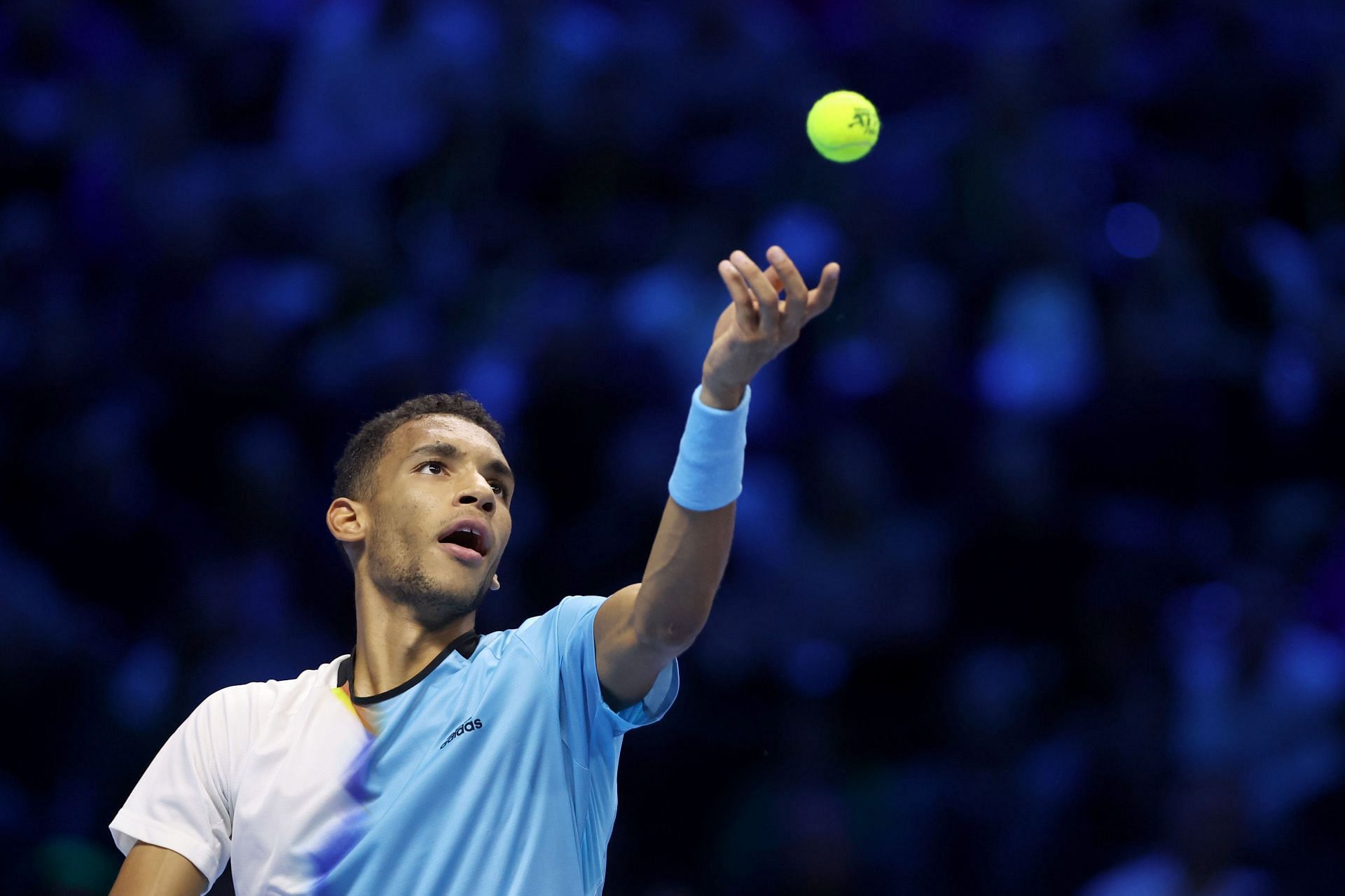 Felix Auger-Aliassime serves at the Nitto ATP Finals