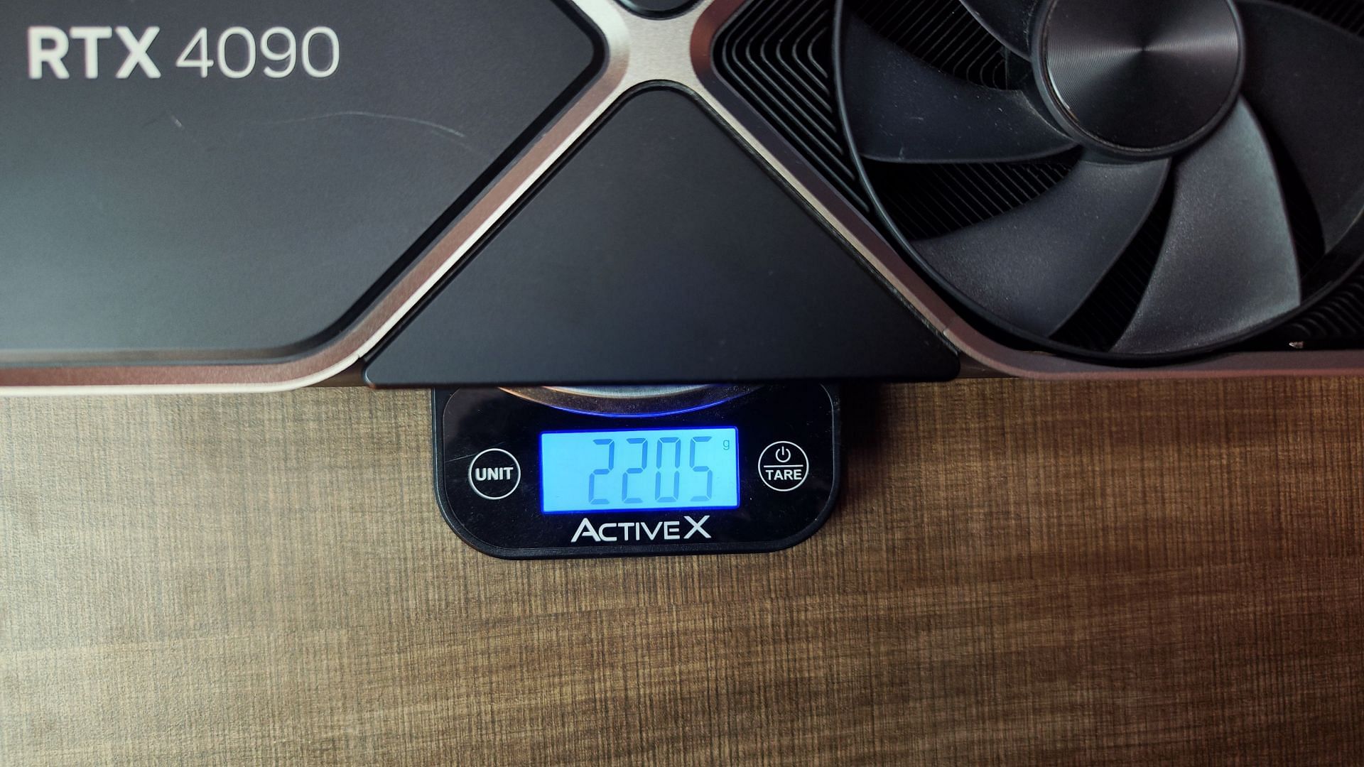 The 4090 weights over 2.2kg (Image via Sportskeeda)