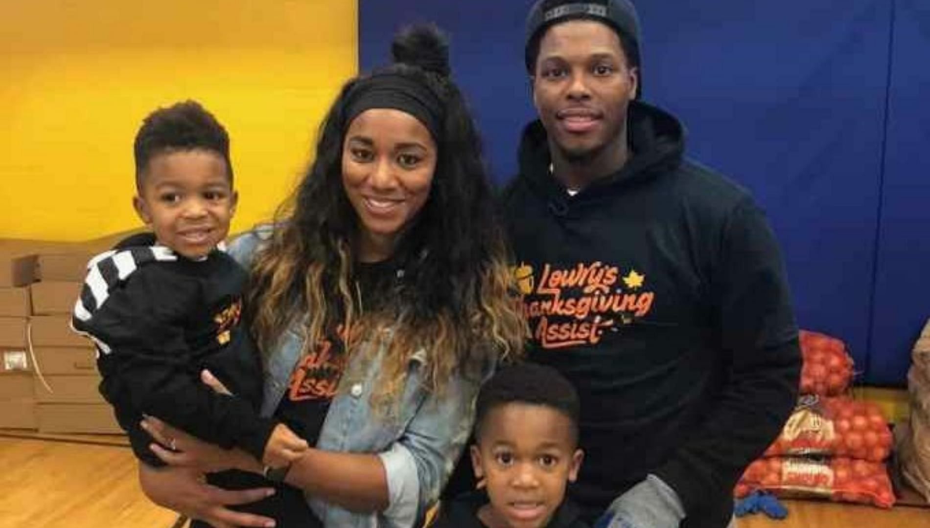 Kyle Lowry and his wife and two kids