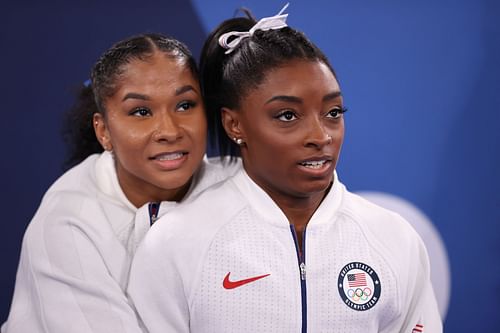 Jordan Chiles embraces her teammate Simone Biles at the Tokyo Olympics, 2021 (Photo by Laurence Griffiths/Getty Images)