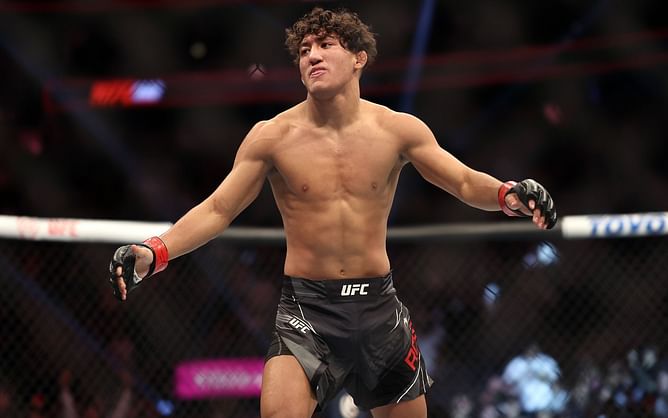 Raul Rosas Jr. gets emotional while celebrating the performance bonus for his fight at UFC 282