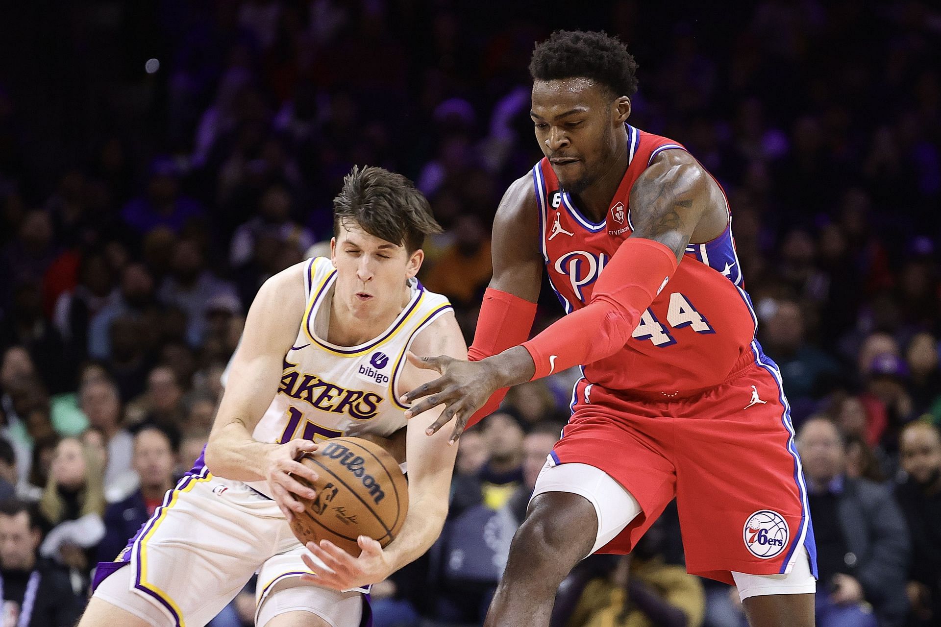 Austin Reaves of the LA Lakers steals the ball from Paul Reed of the Philadelphia 76ers.