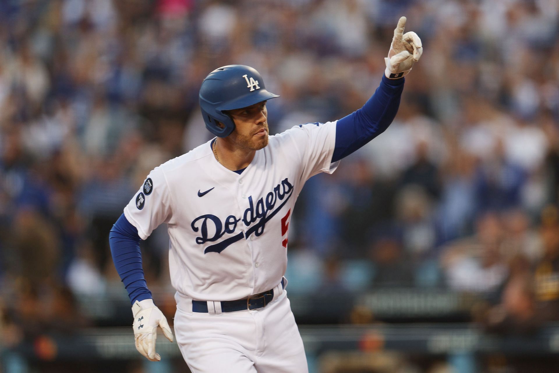 LOS ANGELES, CALIFORNIA - OCTOBER 12: Freddie Freeman #5 of the Los Angeles Dodgers celebrates his solo home run in the first inning in game two of the National League Division Series against the San Diego Padres at Dodger Stadium on October 12, 2022, in Los Angeles, California.  (Photo by Harry How/Getty Images)