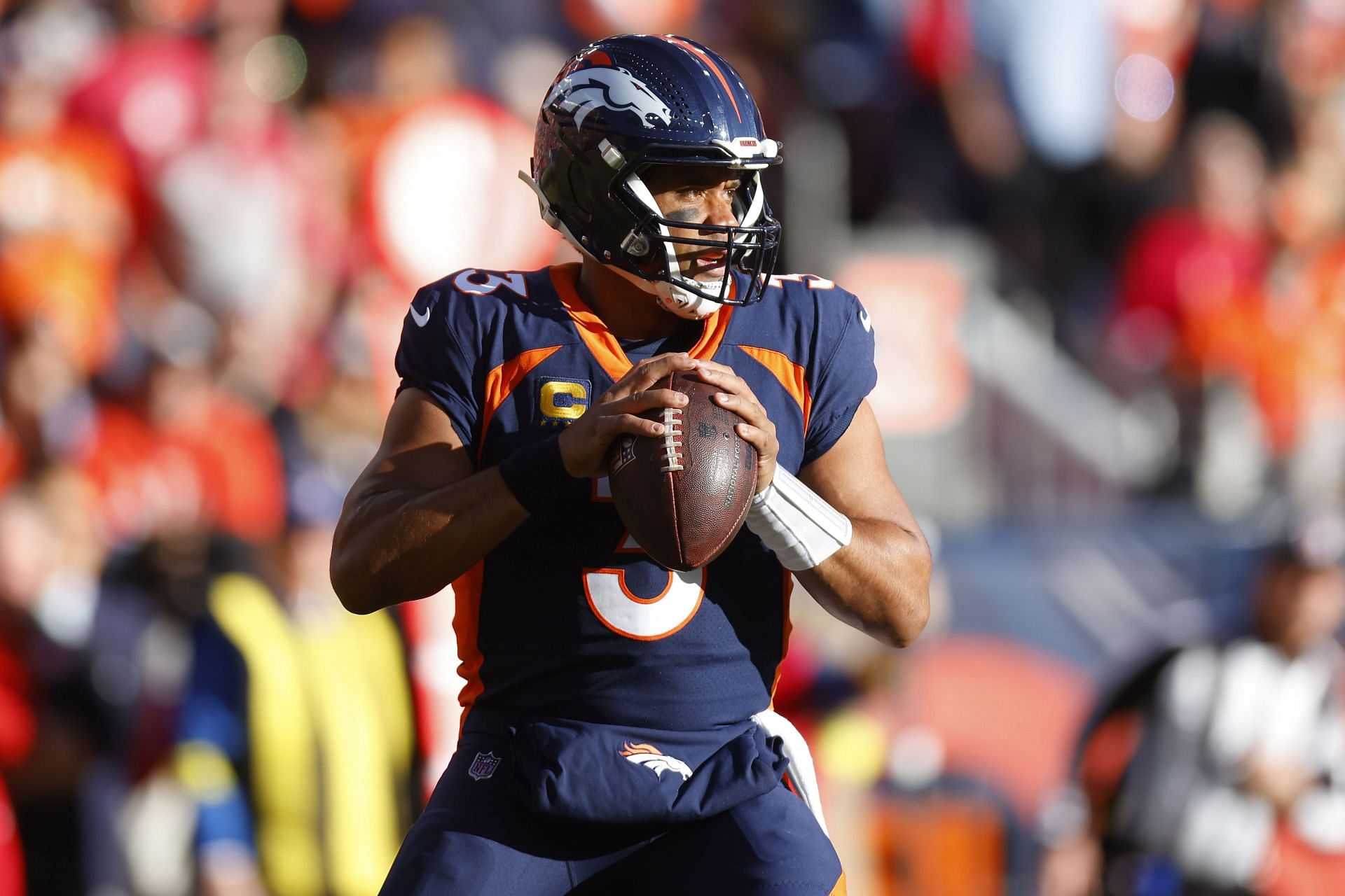 Russell Wilson leaves game with concussion as Chiefs beat Broncos
