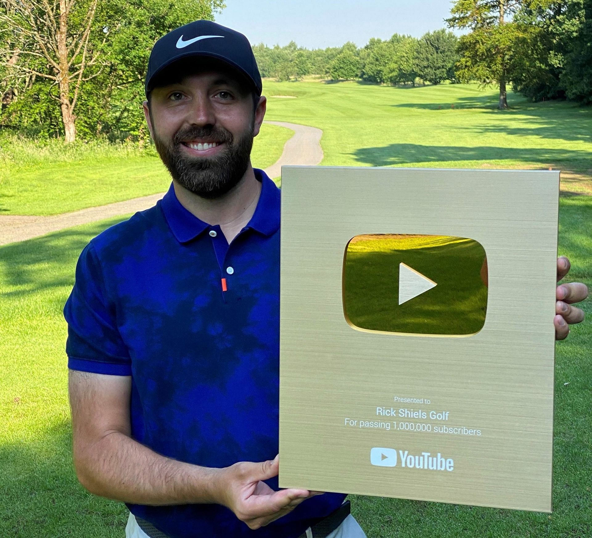 Rick Shiels with his Golden play button after hitting 1 million subscribers