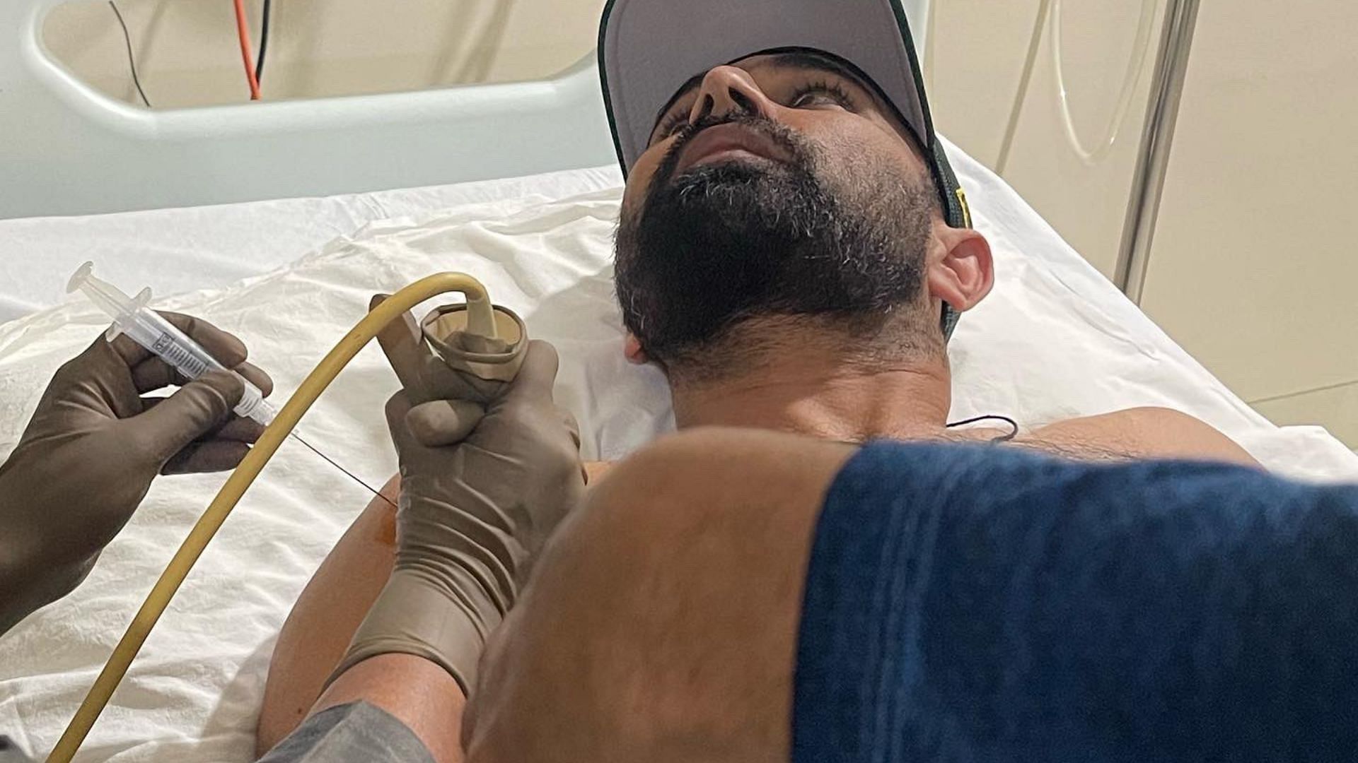 Shami getting medical attention on his injured shoulder. (P.C.:Mohammed Shami Twitter)