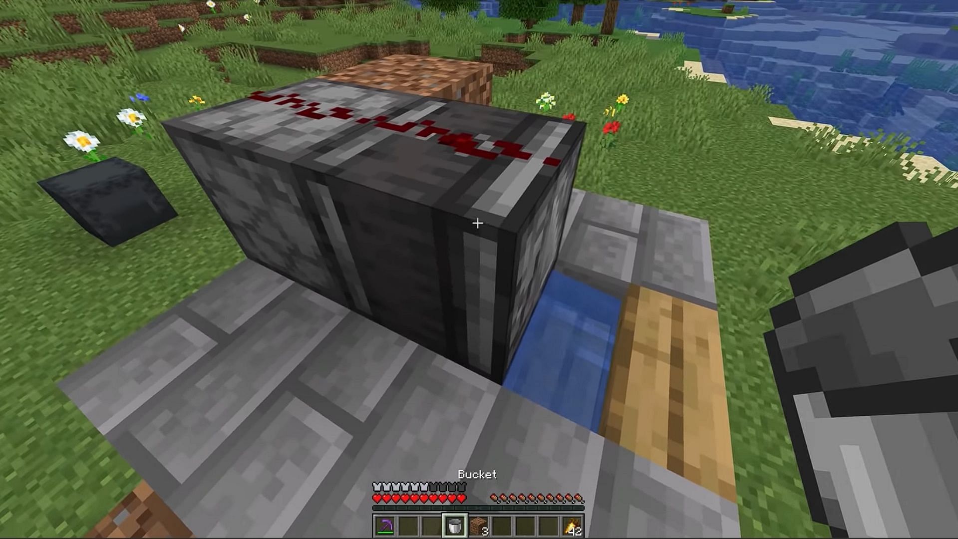 The dropper will keep giving concrete powder as soon as the generated concrete is mined in the Minecraft farm (Image via YouTube/Shulkercraft)
