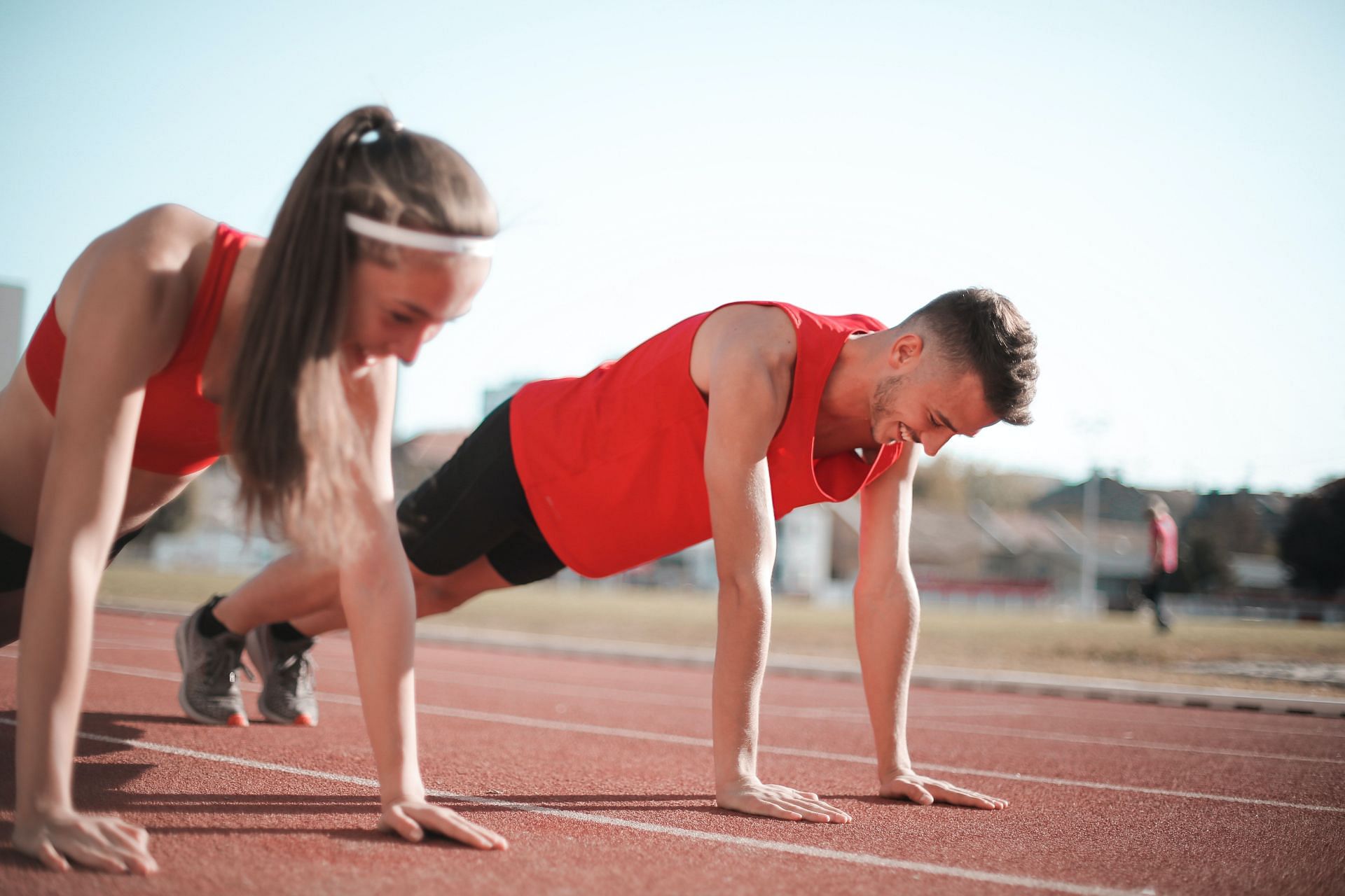 Push ups use your body&#039;s weight as resistance (Image via Pexels/Andrea Piacquadio)