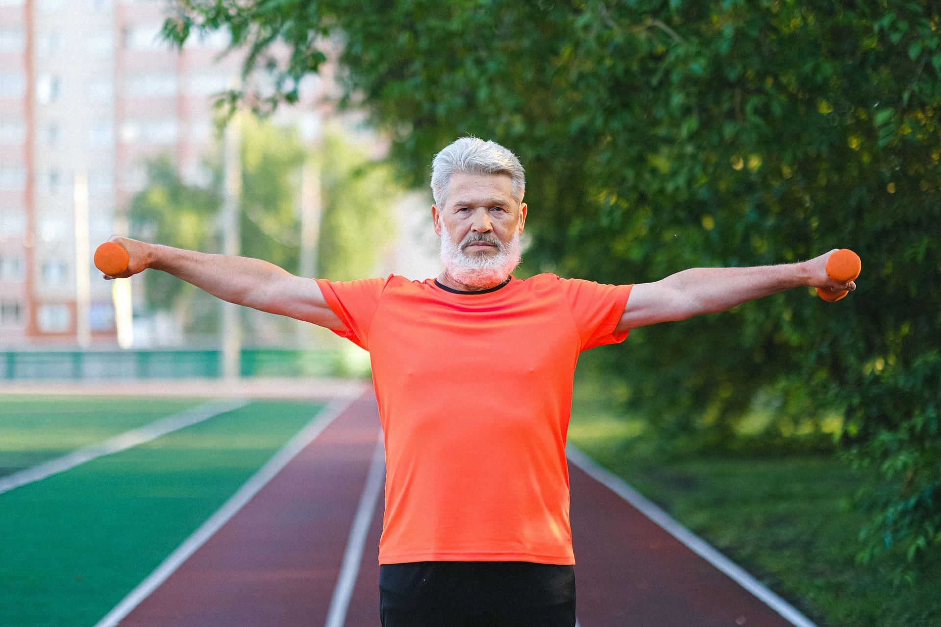 Strengthen your muscles using dumbbells (Image via Pexels/Anna Shvets)