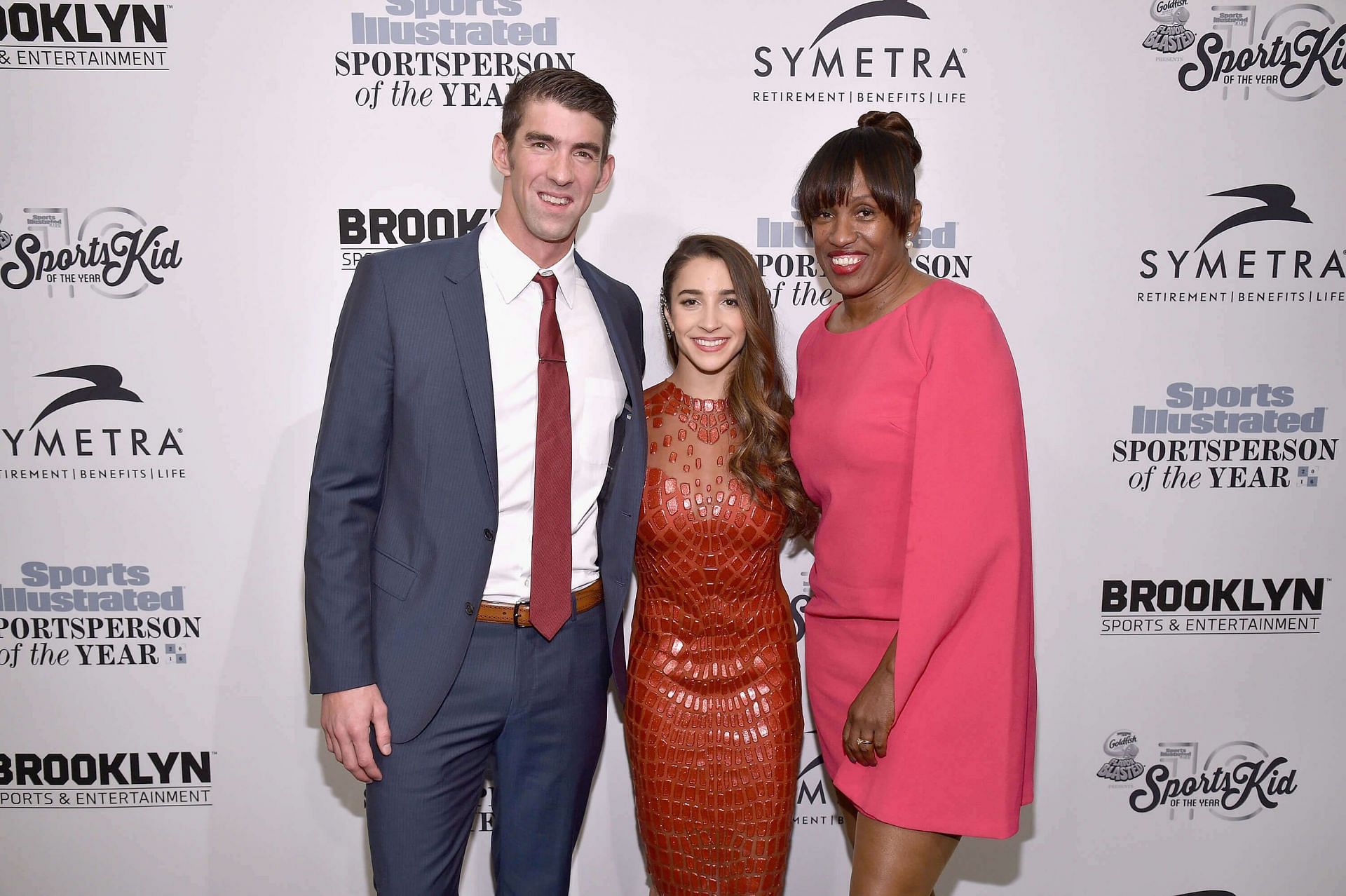 Michael Phelps, Aly Raisman and Jackie Joyner-Kersee (Image via swimmingworldmagazine)