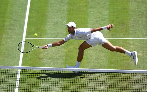 Novak Djokovic in action at The Championships - Wimbledon 2022.