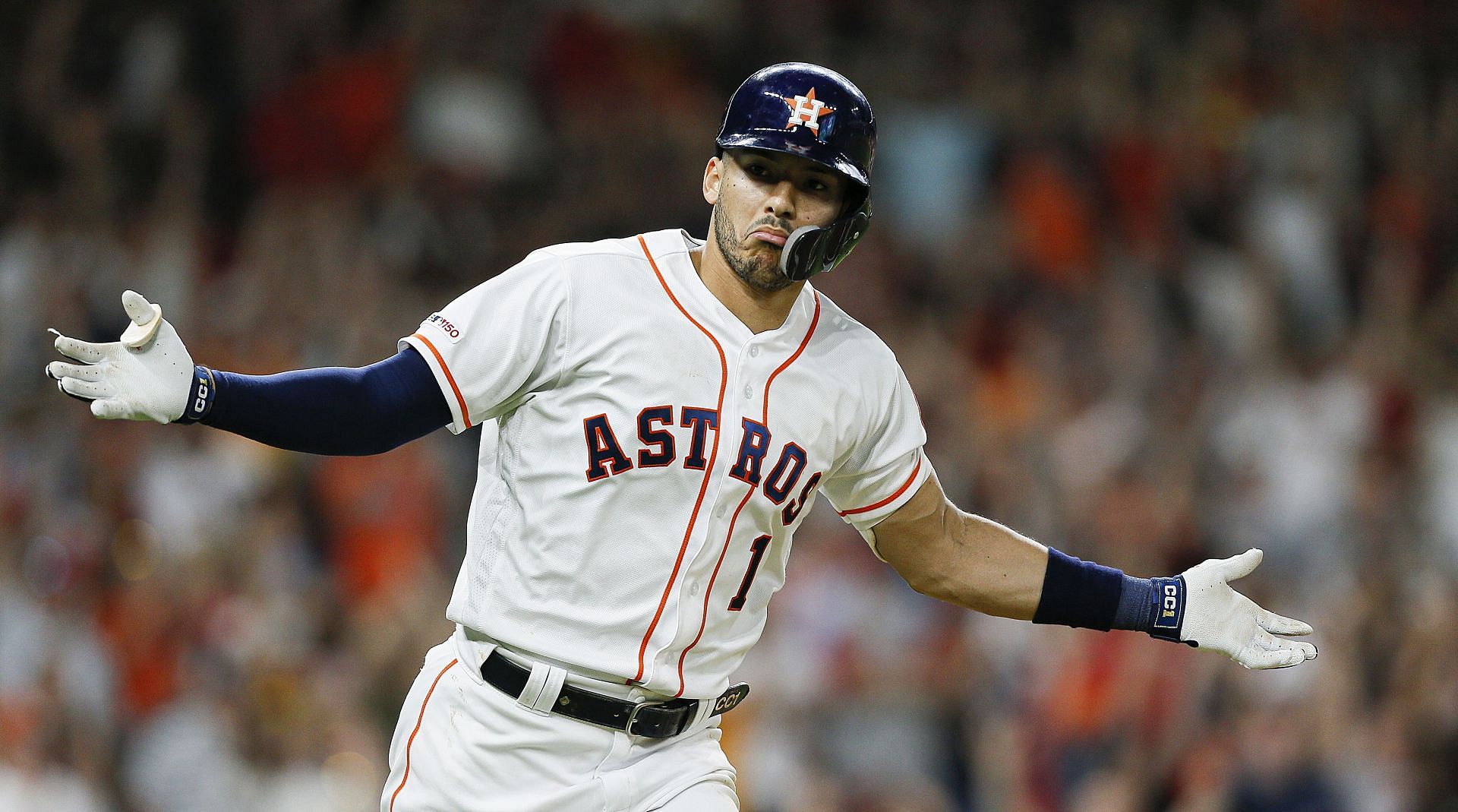 HOUSTON, TEXAS - MAY 25: Carlos Correa #1 of the Houston Astros celebrates after hitting a walk-off single in the ninth inning against the Boston Red Sox at Minute Maid Park on May 25, 2019, in Houston, Texas.  (Photo by Bob Levey/Getty Images)