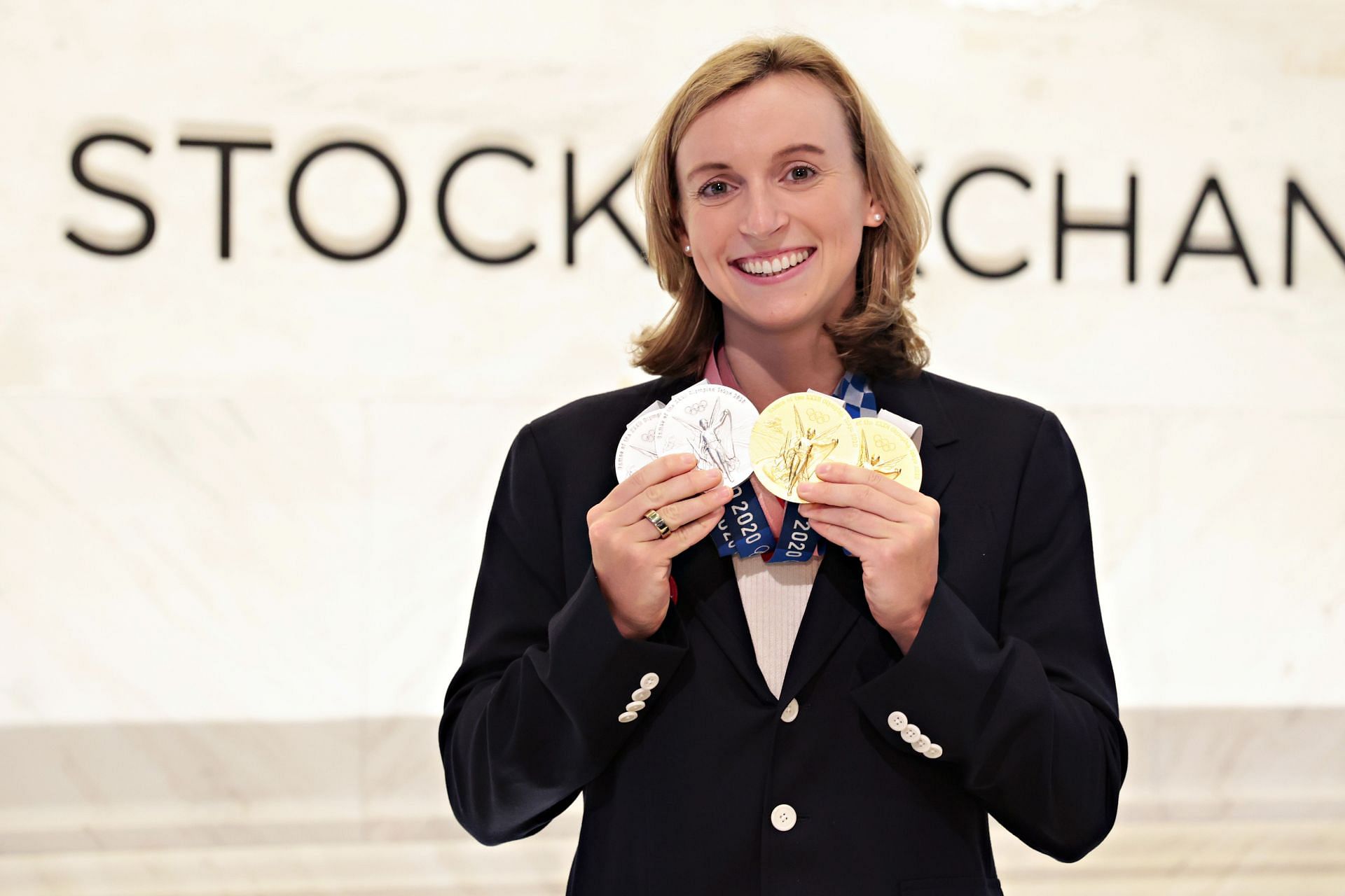 Olympic Swimmer Katie Ledecky Rings New York Stock Exchange Closing Bell