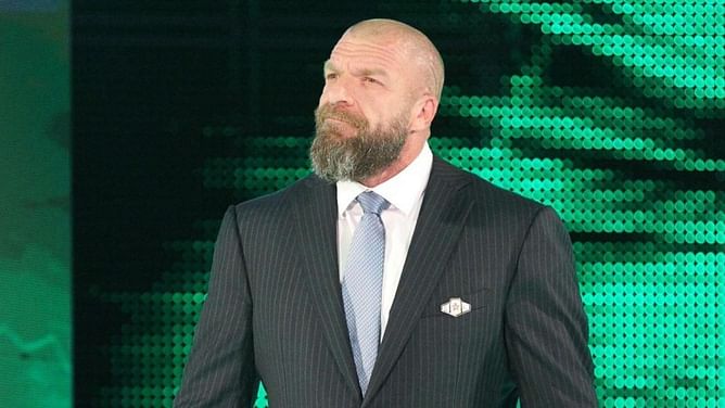 [Photo] Triple H recreates iconic pose with 11-time WWE Tag Team Champions