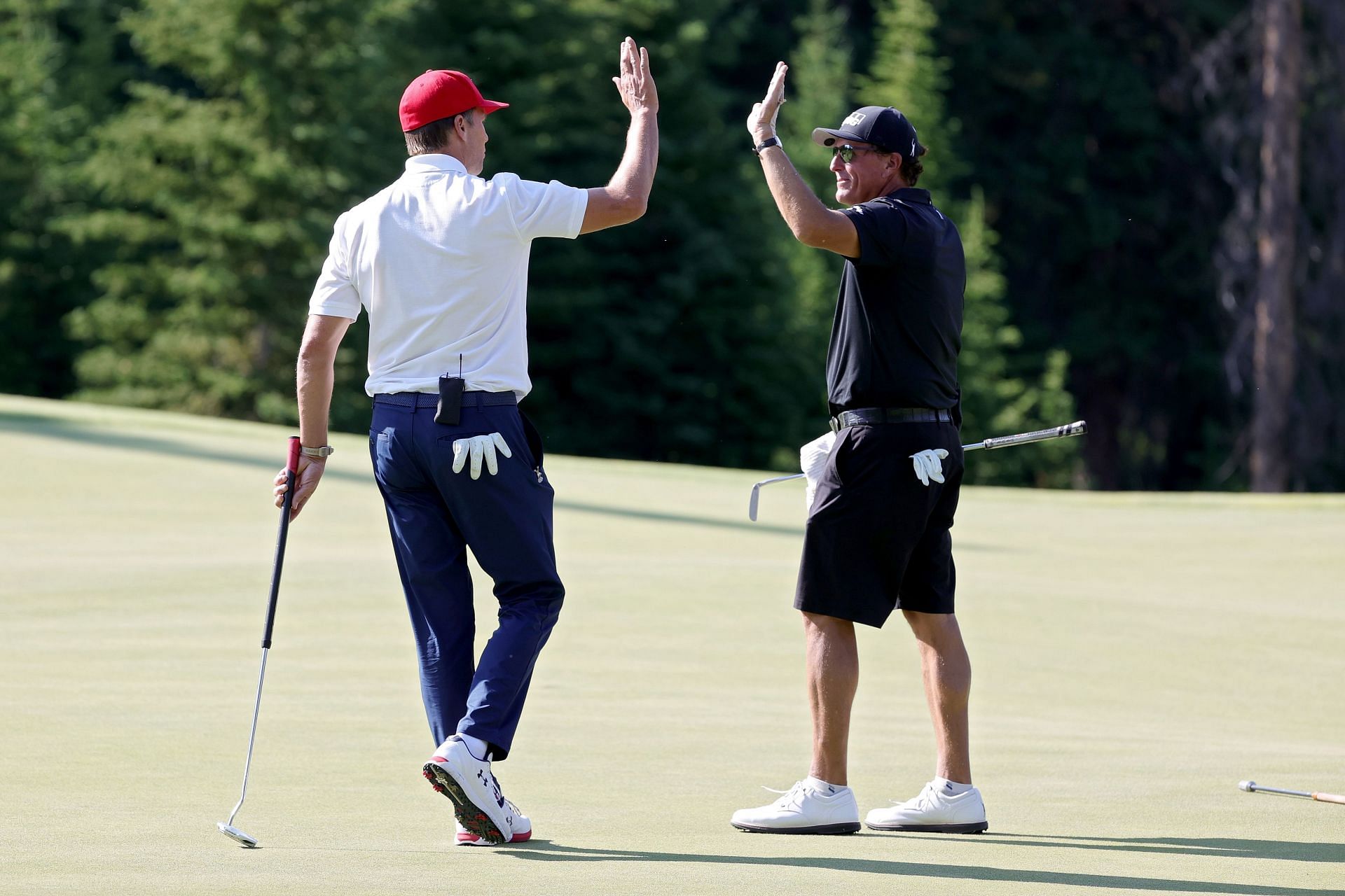 Tom Brady and Phil Mickelson at Capital One's The Match (Image via Stacy Revere/Getty Images for The Match)