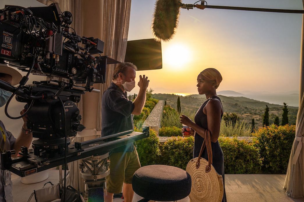 Rian Johnson explains a scene to Janelle Mon&aacute;e. (Photo via Netflix)