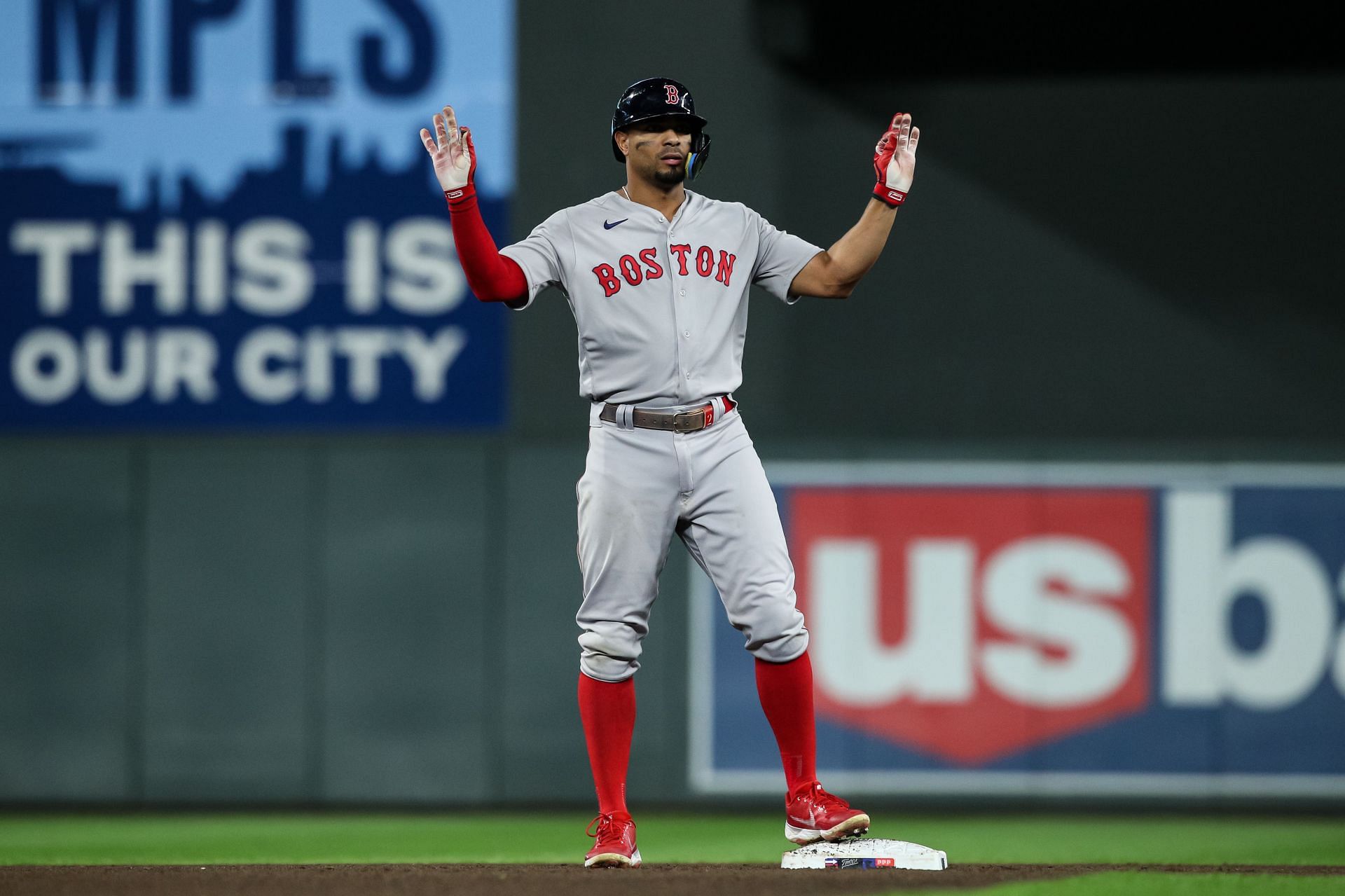 Xander Bogaerts #2 of the Boston Red Sox celebrates his RBI double