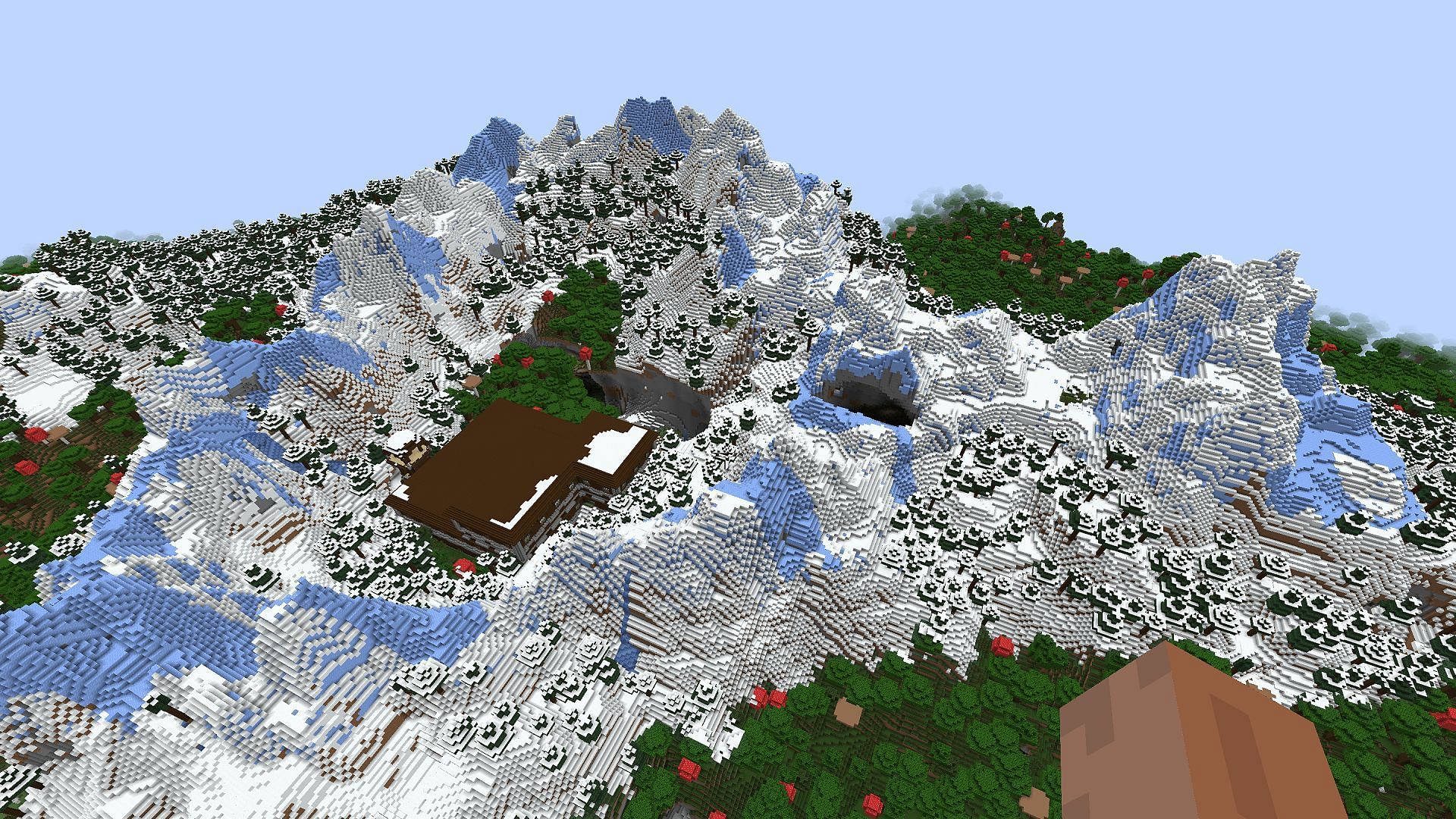This seed&#039;s spawn includes a snowy mountain range complete with some intriguing structures (Image via u/ElegantComplaint7795/Reddit)