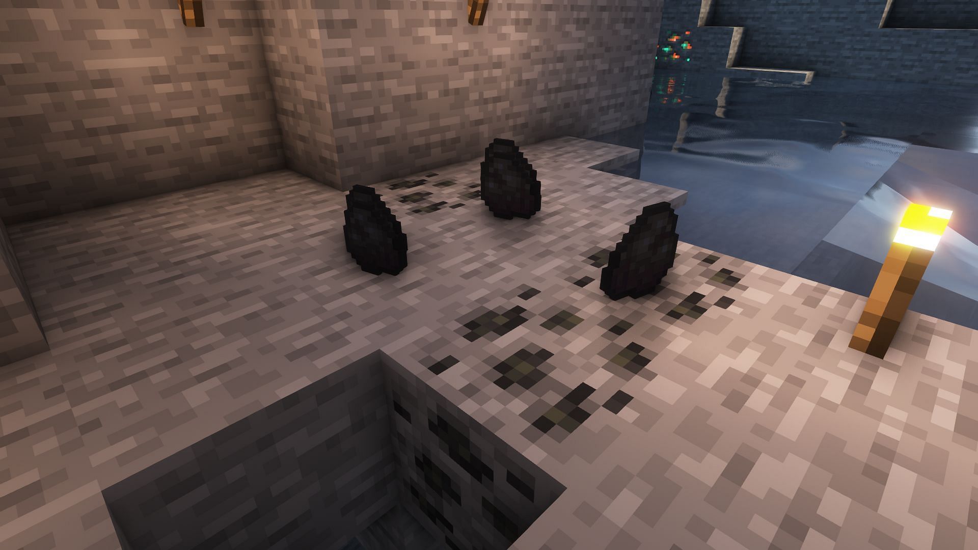 Coal and coal ores in Minecraft (Image via Mojang)