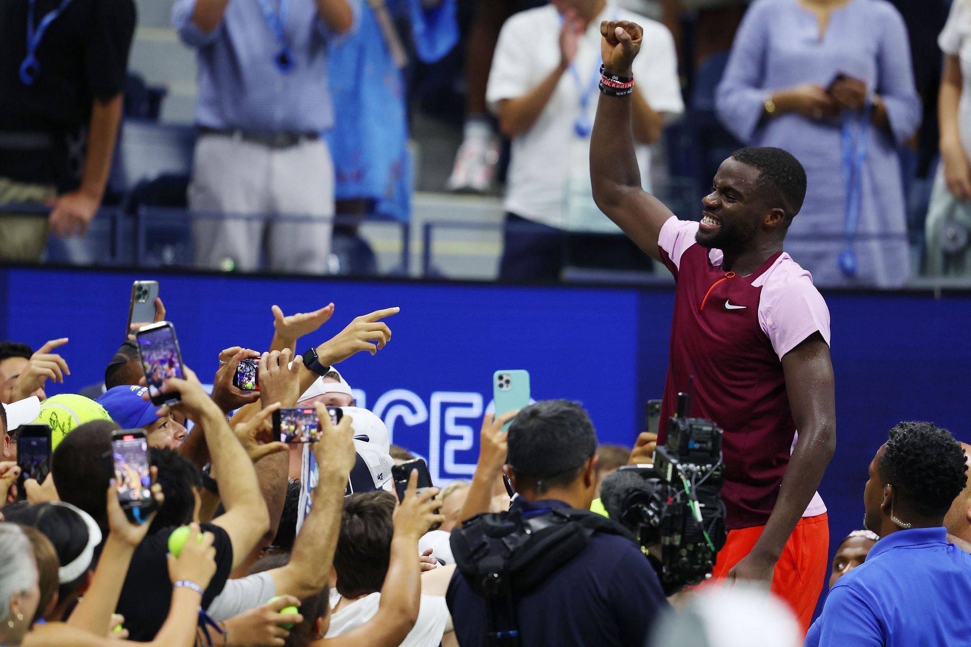 Frances Tiafoe celebrates his win over the four-time champion at the 2022 US Open
