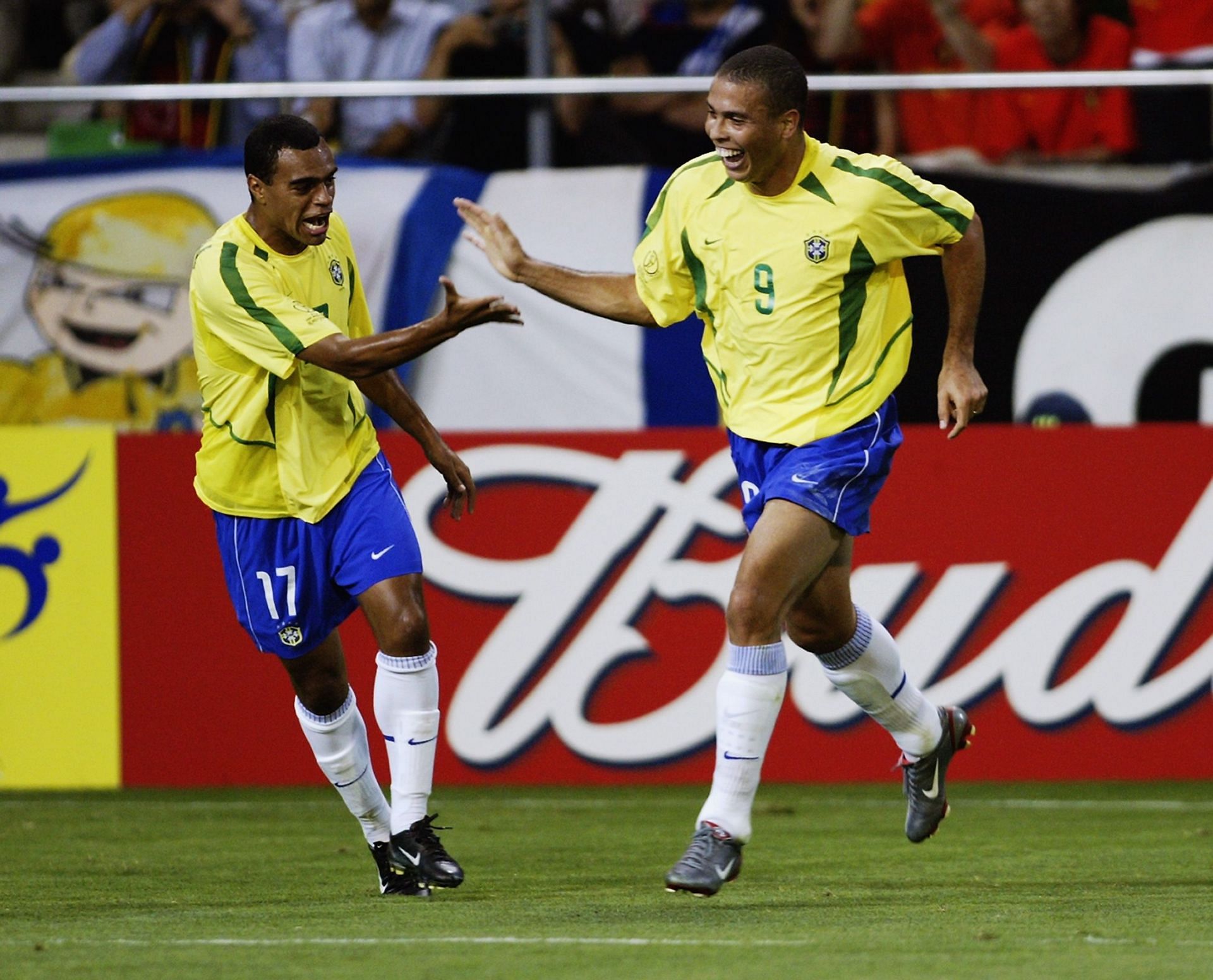Ronaldo of Brazil celebrates his goal with team-mate Denilson