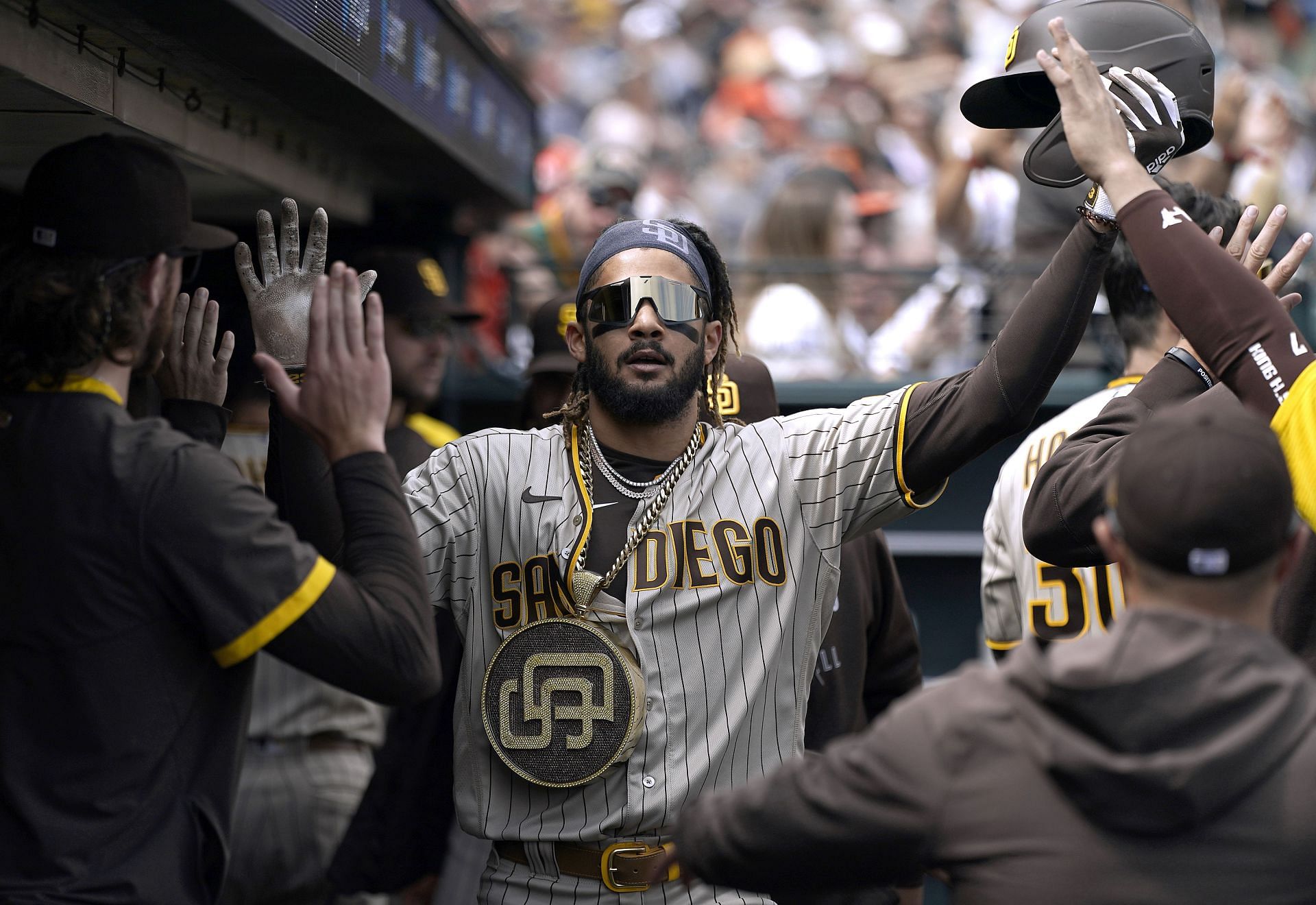 Fernando Tatis Jr. #23 of the San Diego Padres reacts after
