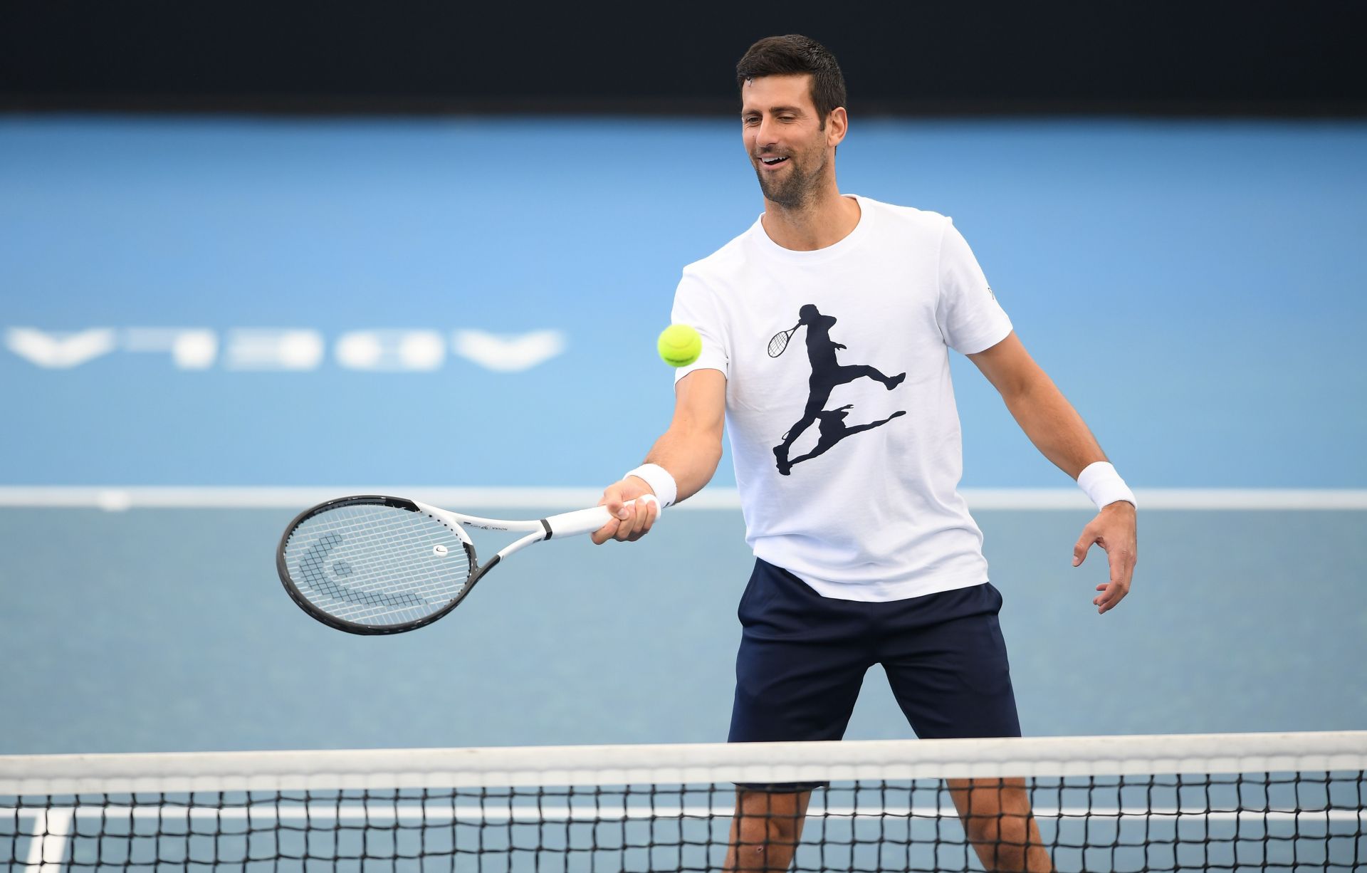 Novak Djokovic playing a relaxed warm-up with his training team at the 2023 Adelaide International