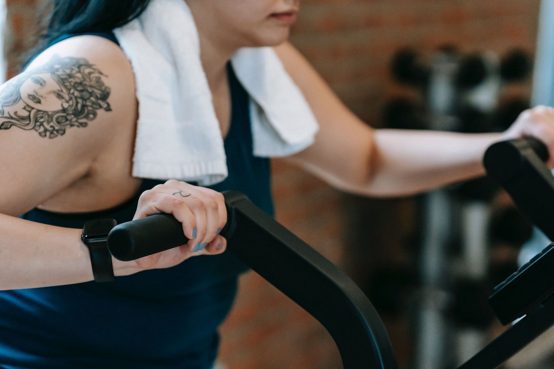 Stationary bikes are a great option for cycling at home. (Image via Pexels/ Andres Ayrton)