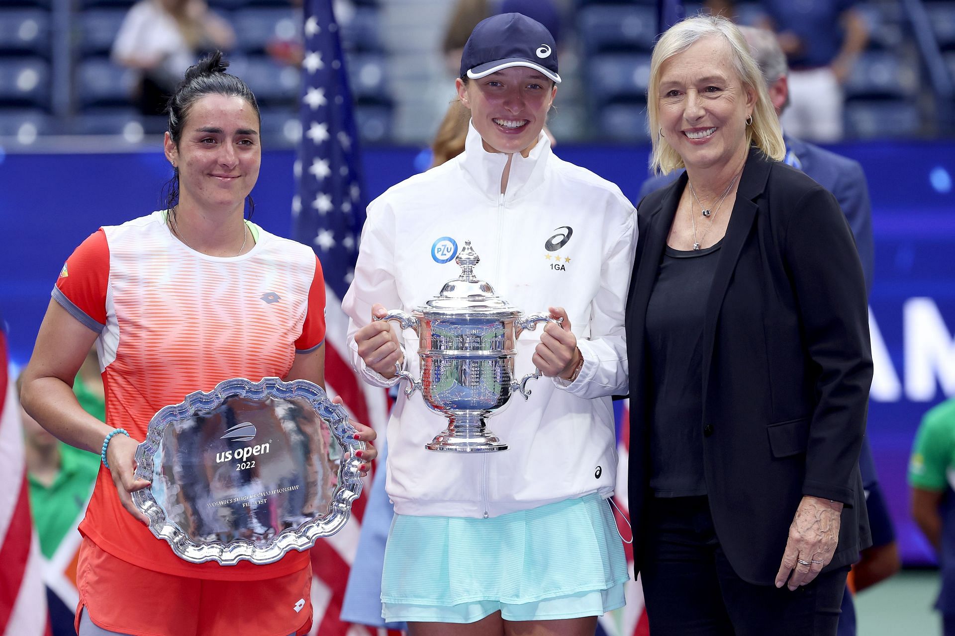 Ons Jabeur of Tunisia, Iga Swiatek of Poland, and Martina Navratilova pose for a picture at the 2022 US Open.