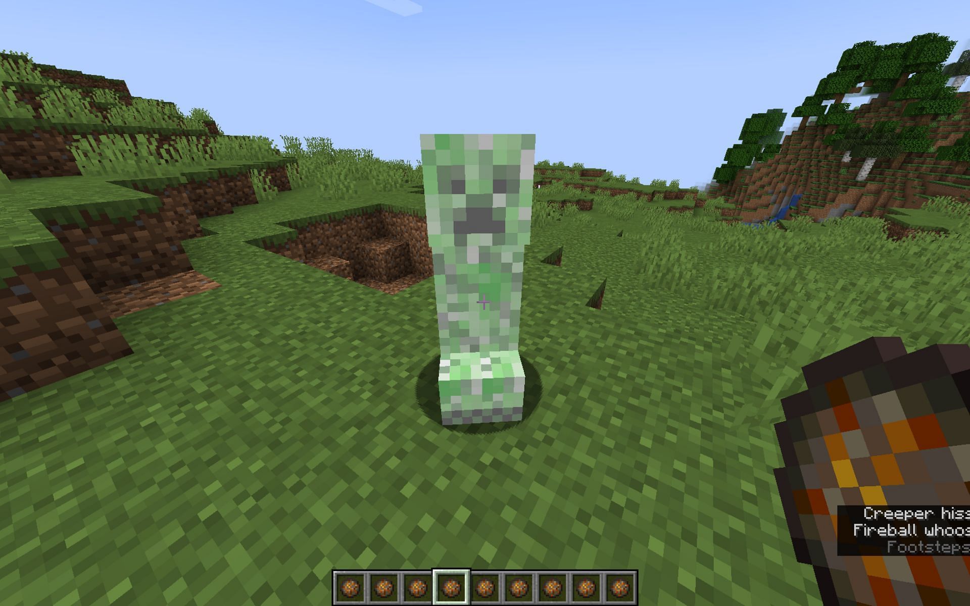 A Creeper ignited using a fire charge, a new feature in Minecraft 1.19.3 (Image via Mojang)
